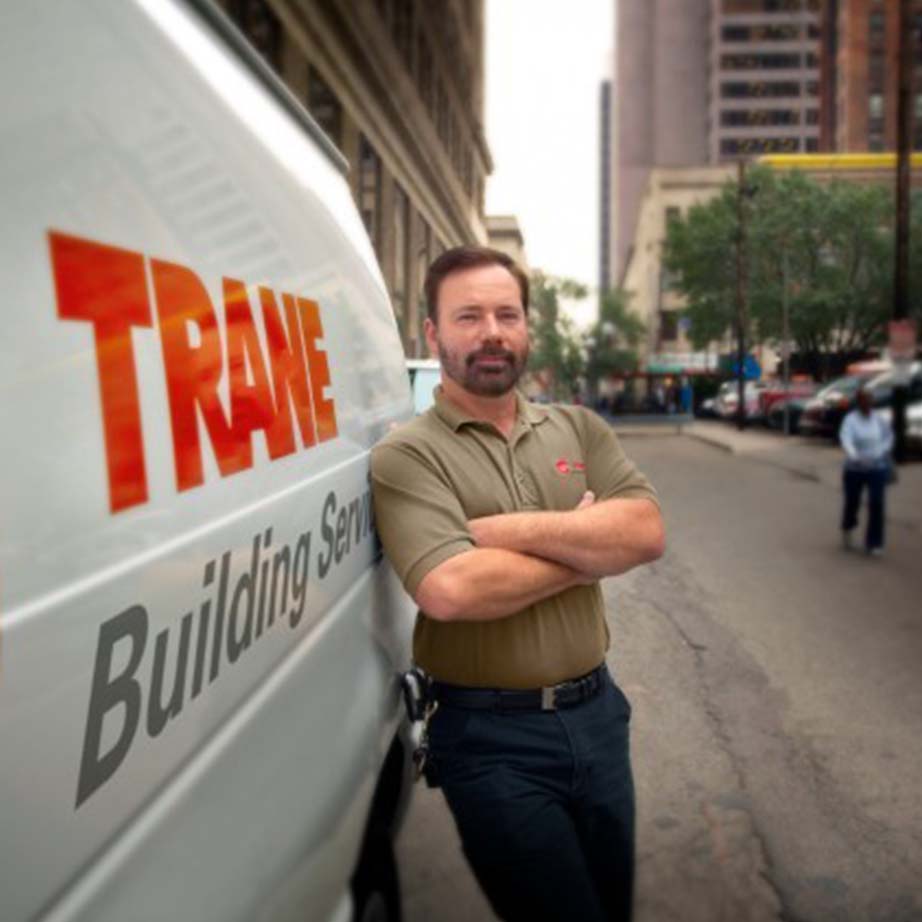 Tech beside Trane Truck