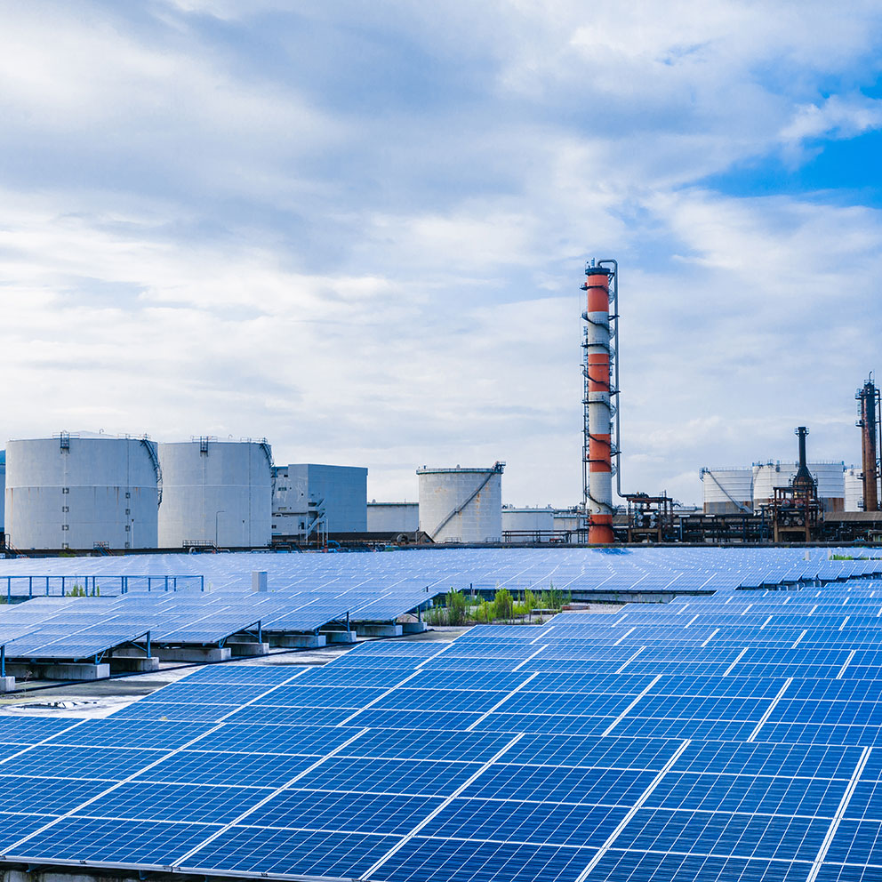 industrial buildings and solar panels. renewable energy concept.