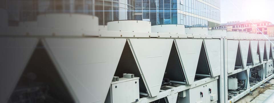 air conditioner outside machine with building background