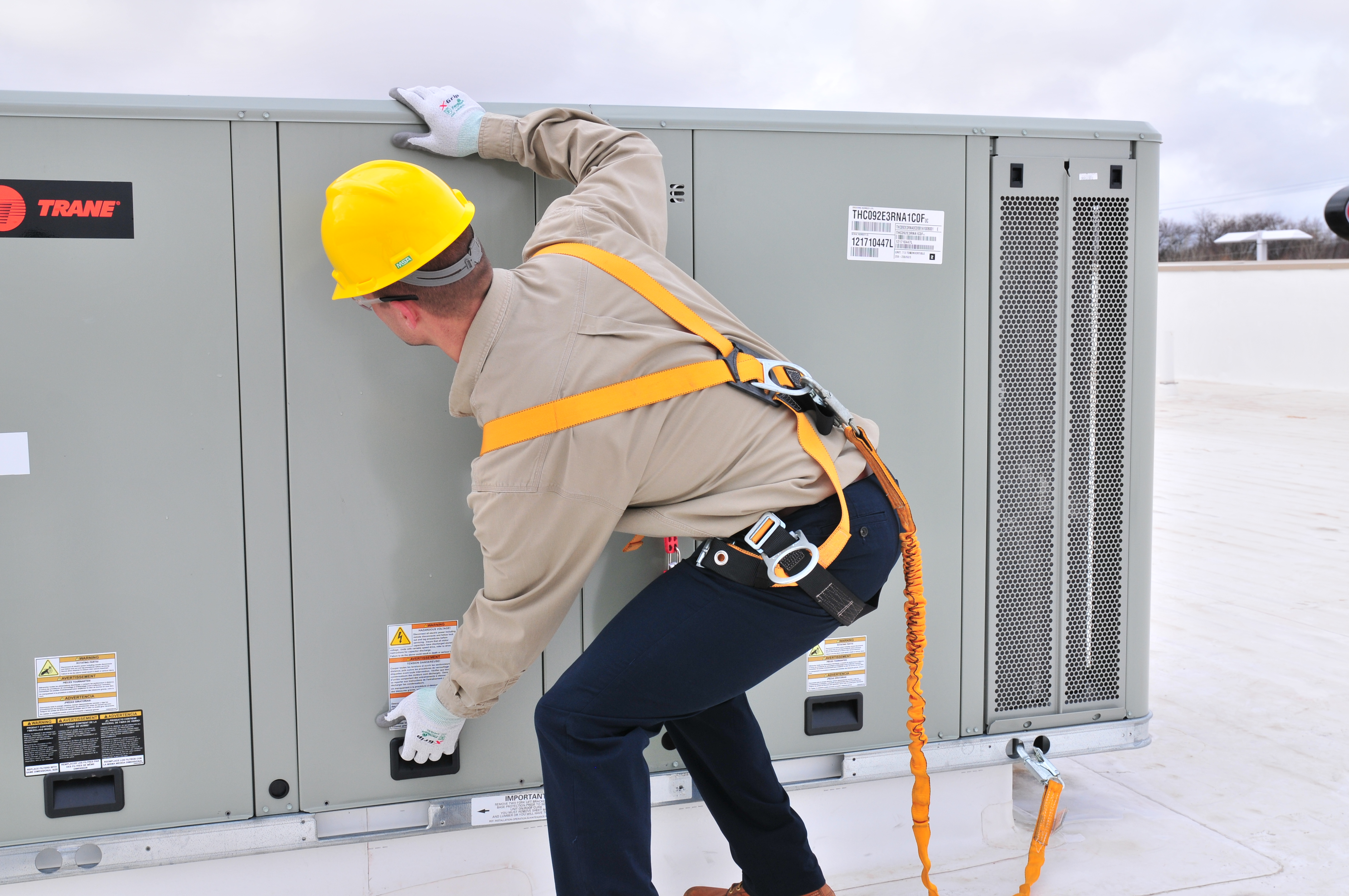 Service Technician Removing Precedent Panel