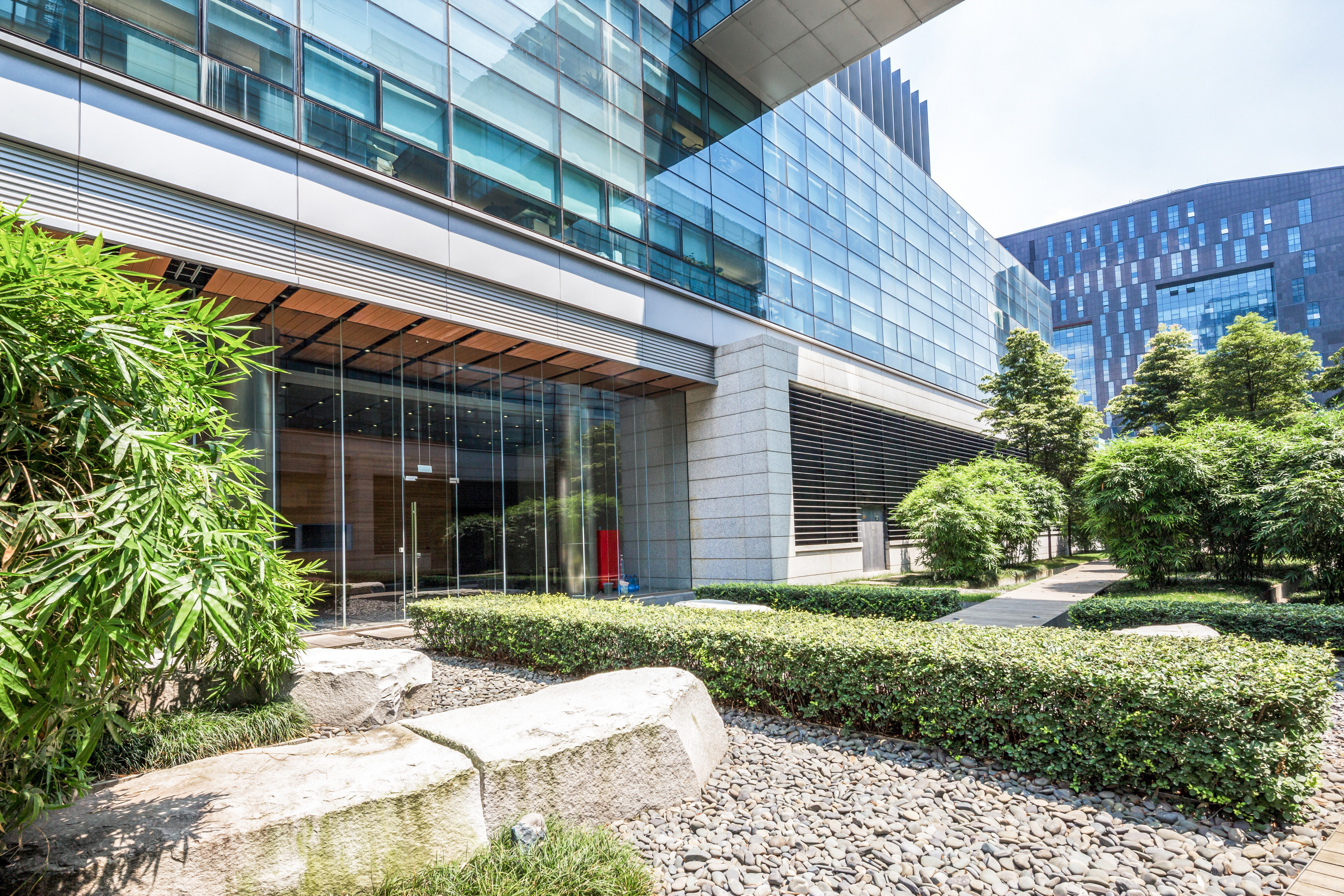 modern building and green footpath